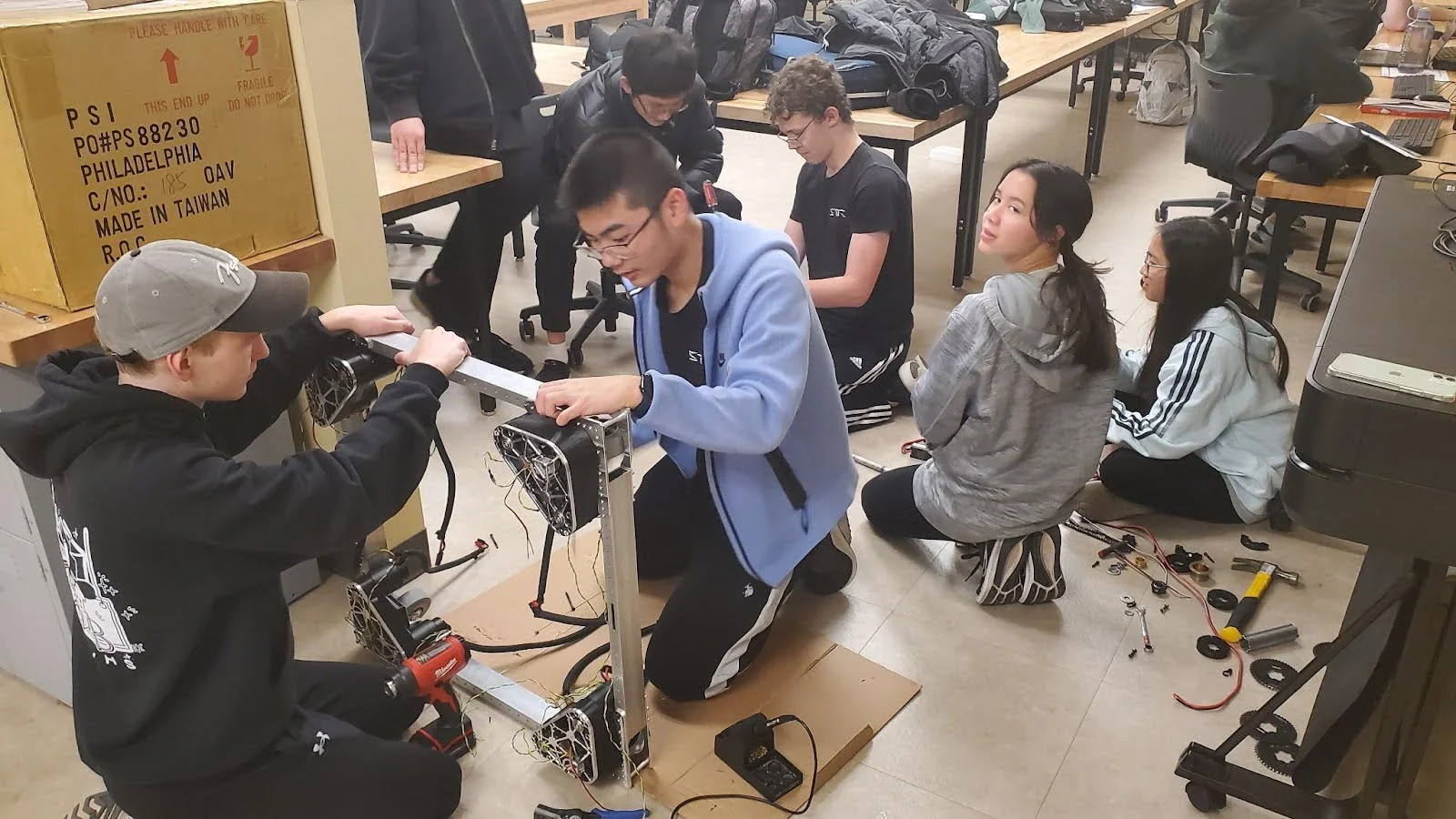Building the frame that houses the battery, electronics and motors